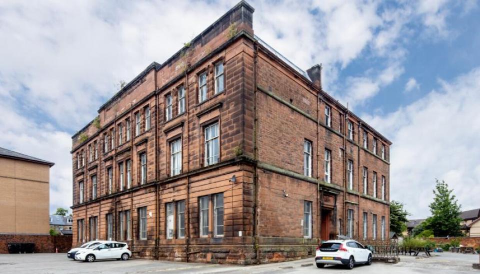 Red sandstone building at 39 Napiershall Street 